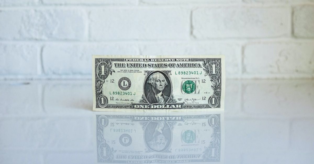 1 U.S. dollar banknote on white surface